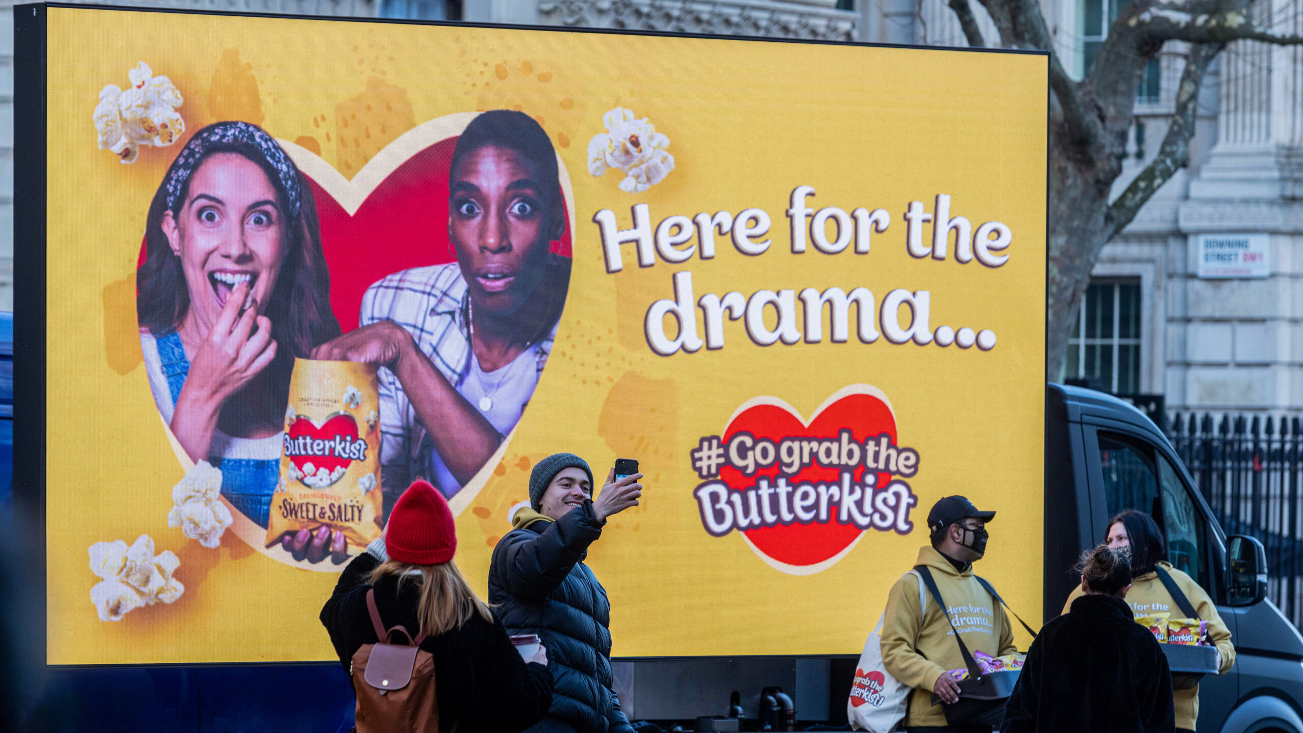Person taking selfie with Butterkist Digivan within London