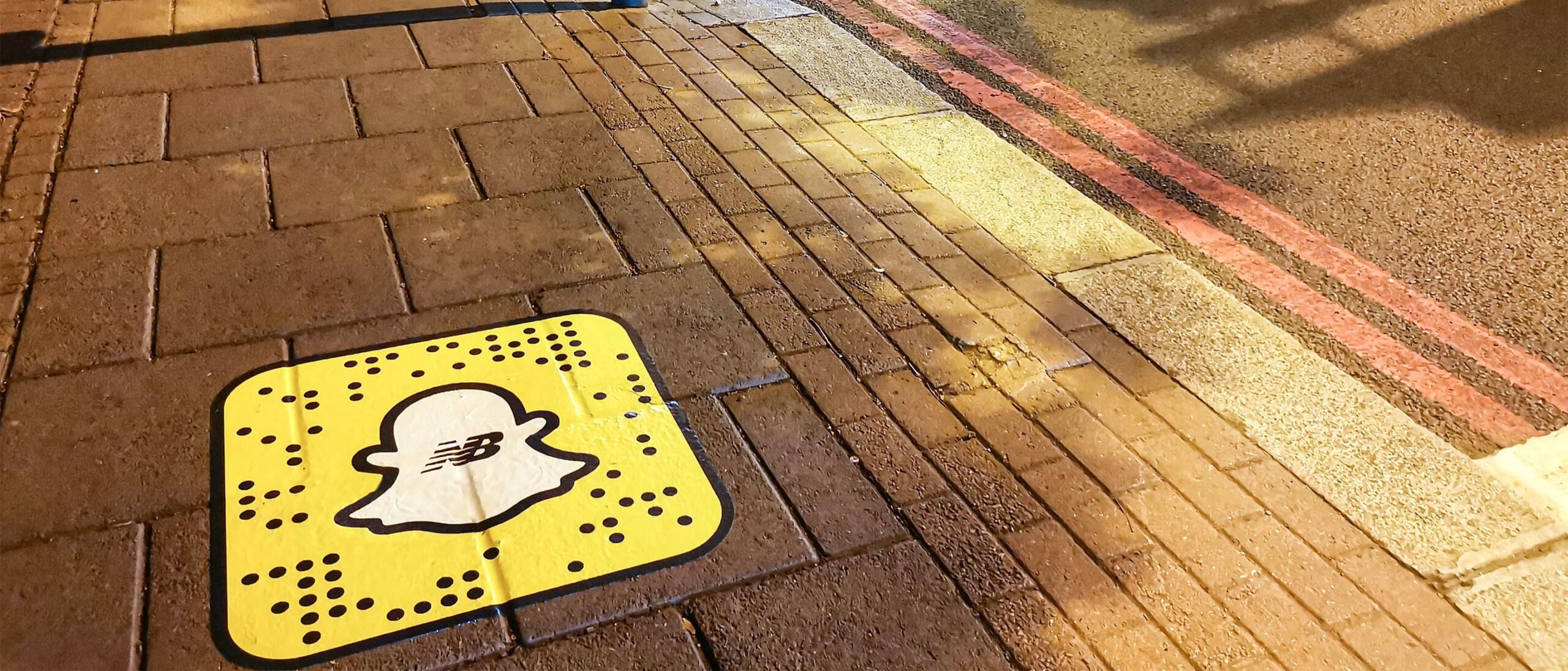 New Balance Snapchat vinyl on pavement